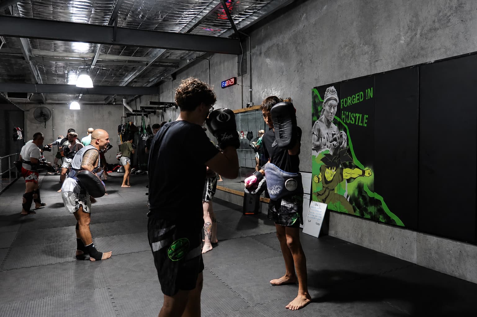 Muay Thai pad work training — BioWeapon