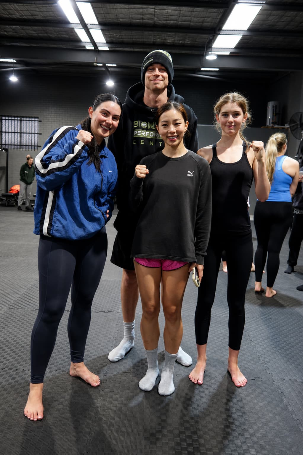 BioWeapon community — Cameron with members after training